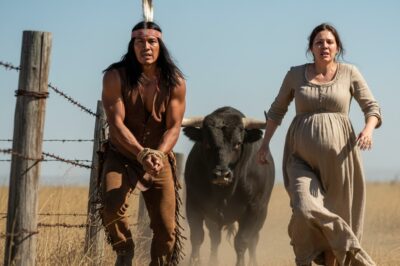 A pregnant young woman quietly frees an Apache from a fence trap.