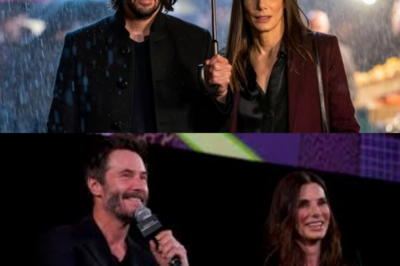 Keanu Reeves and Sandra Bullock’s Late-Night Walk in Japan — A Moment of Pure Peace 🌙 That’s what the photos claim, but insiders hiss that beneath the paper lantern glow and whisper-quiet streets, two familiar souls were navigating a minefield of memories, restraint, and emotions too disciplined to spill, as passersby sensed something heavy hiding behind those calm silhouettes — our narrator scoffs softly, suggesting that in Hollywood, “peace” is often just the prettiest disguise for feelings screaming to be acknowledged 👇