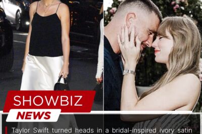 Taylor Swift turned heads in a bridal-inspired ivory satin skirt as she stepped out ahead of the summer, with fans buzzing about her elegant look and ongoing conversations surrounding her relationship with Travis Kelce, as the singer continues to capture attention with her style and public appearances.